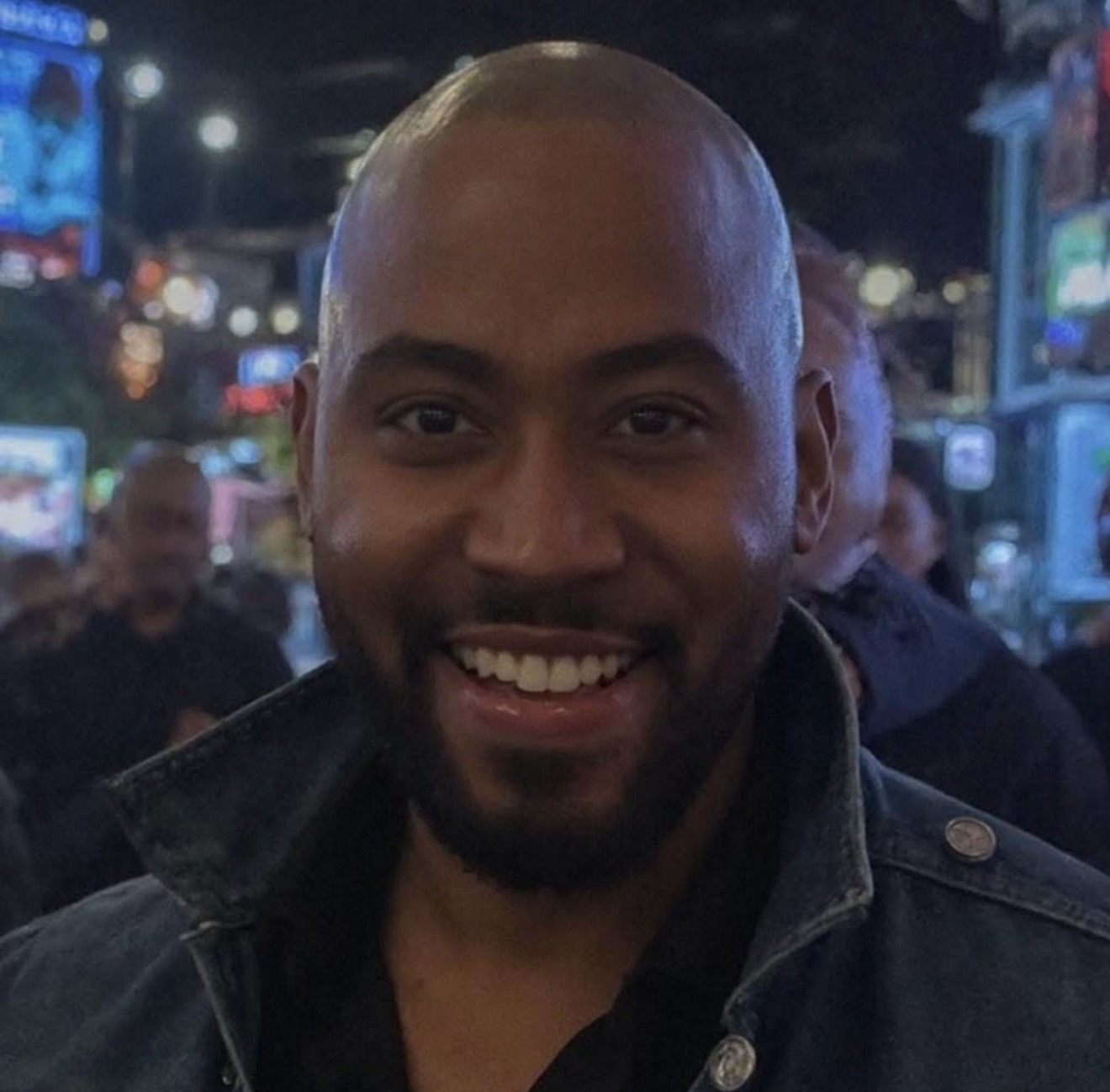 Austin Durham smiling at an evening event
