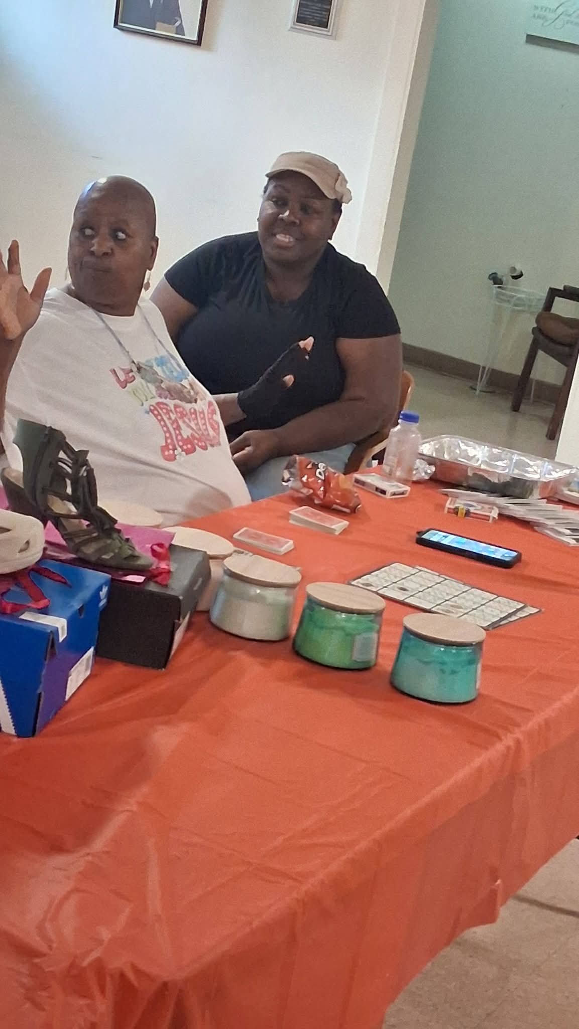 Community members at a My Sistas House Ministries Adopt a family for Christmas event