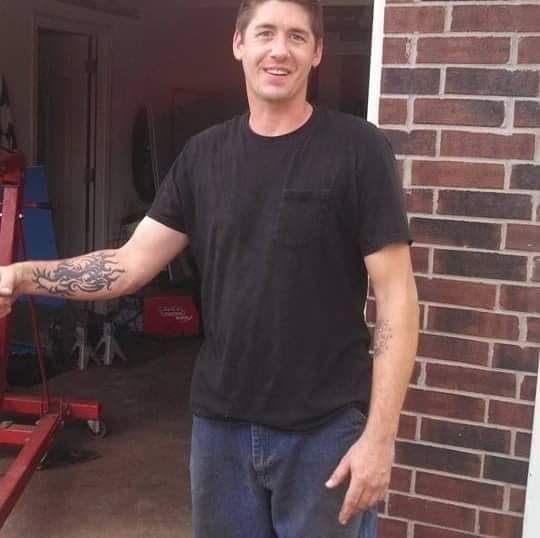 James working on a customer vehicle in the Spokane area