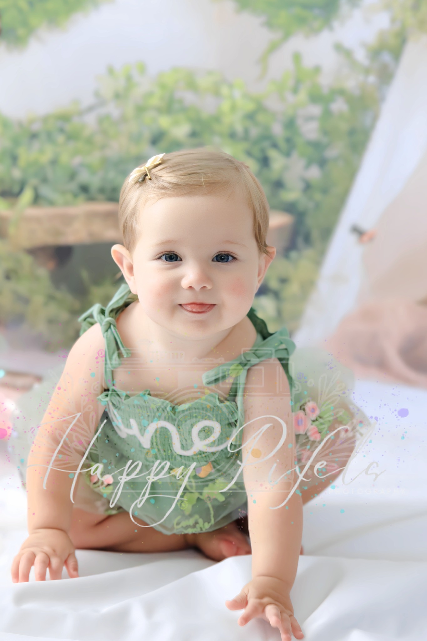 Baby milestone portrait on a soft white blanket