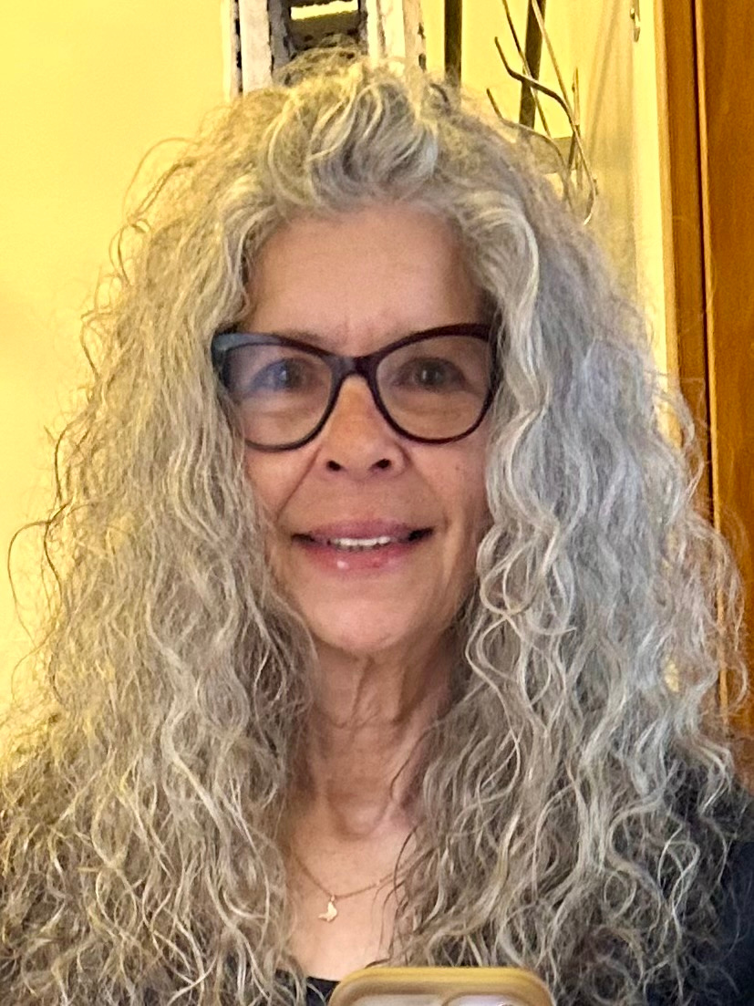 Portrait of Jacquie Warden, author and retired veteran