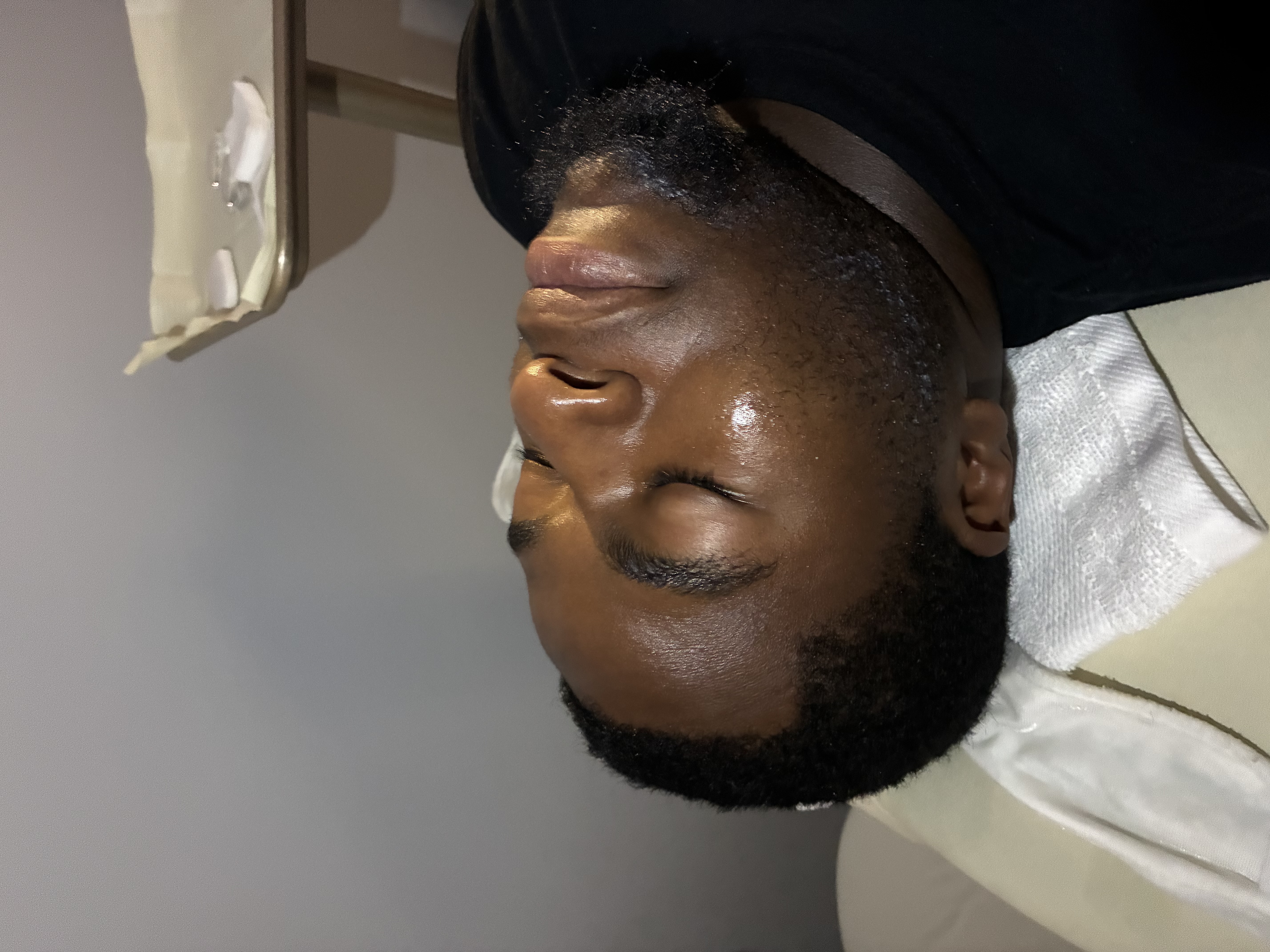 Client receiving a customized facial at Bare Grace Studio