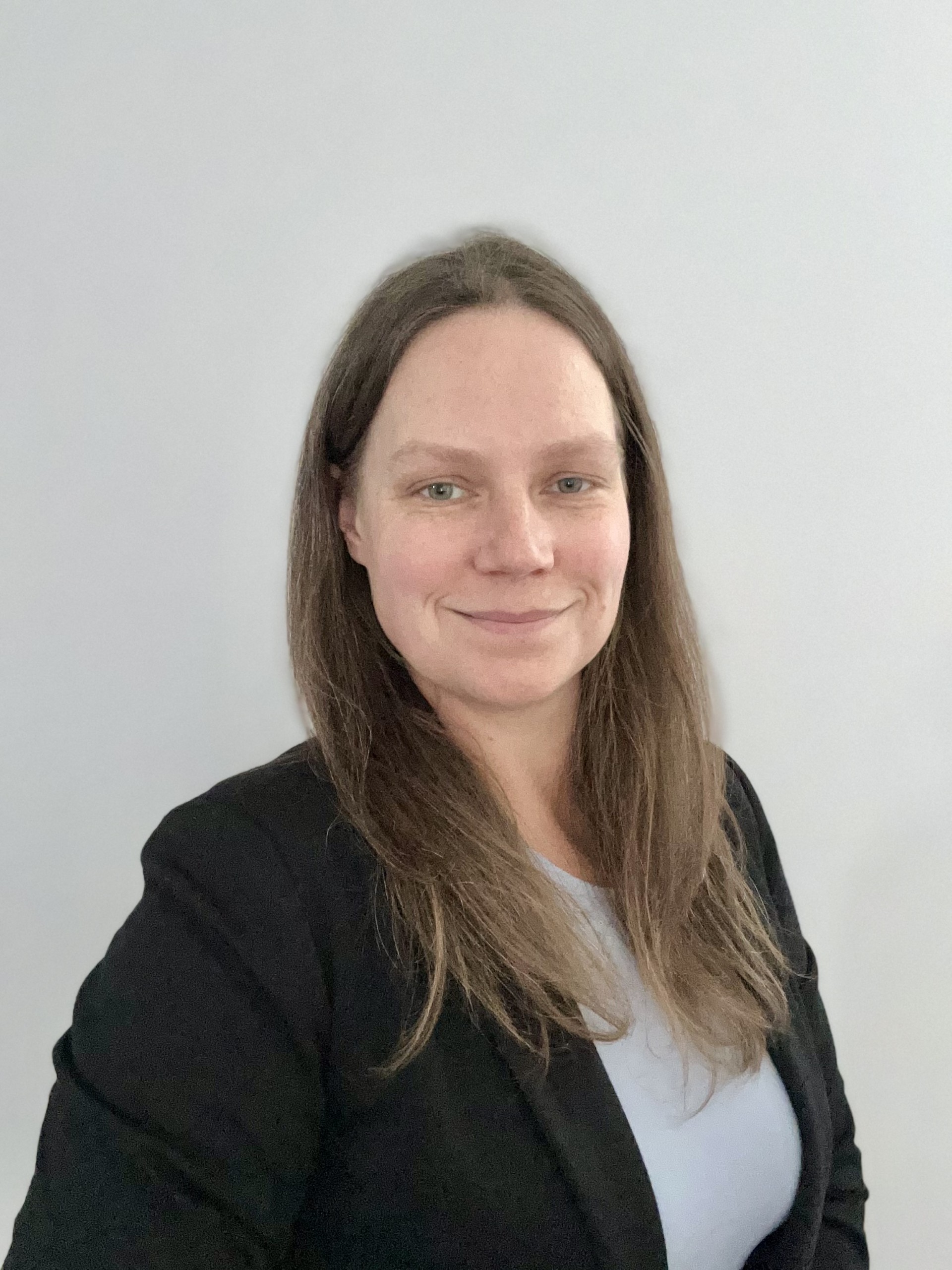 Kelsey Annan working hands-on with home systems