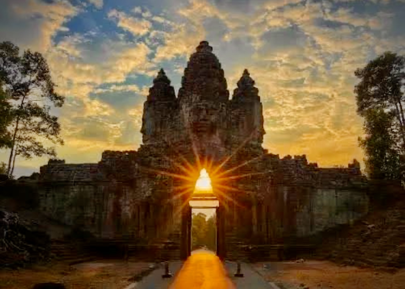 Angkor Wat towers glowing at dawn