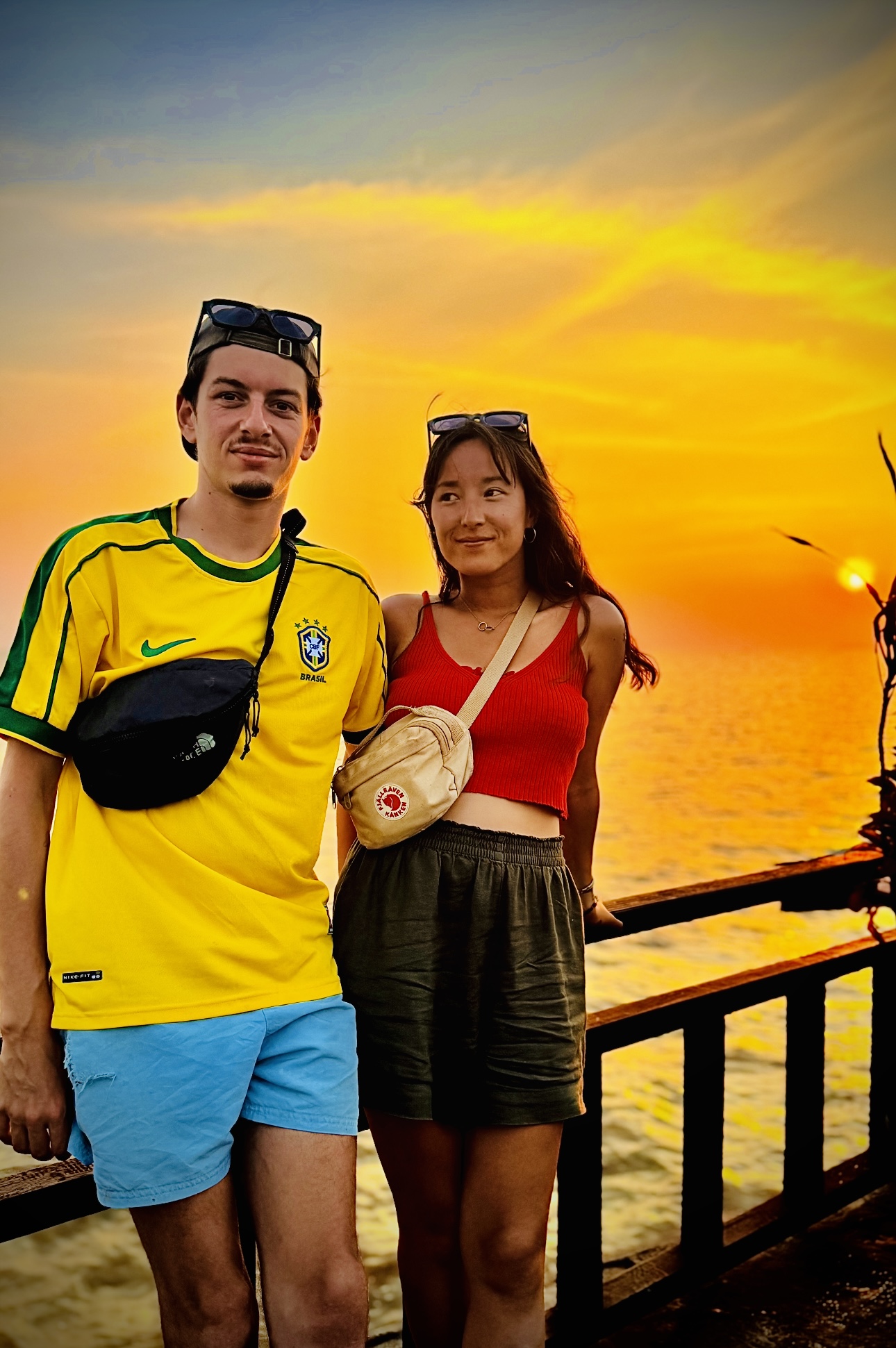 Guests celebrating a Siem Reap sunset during a party bus tour