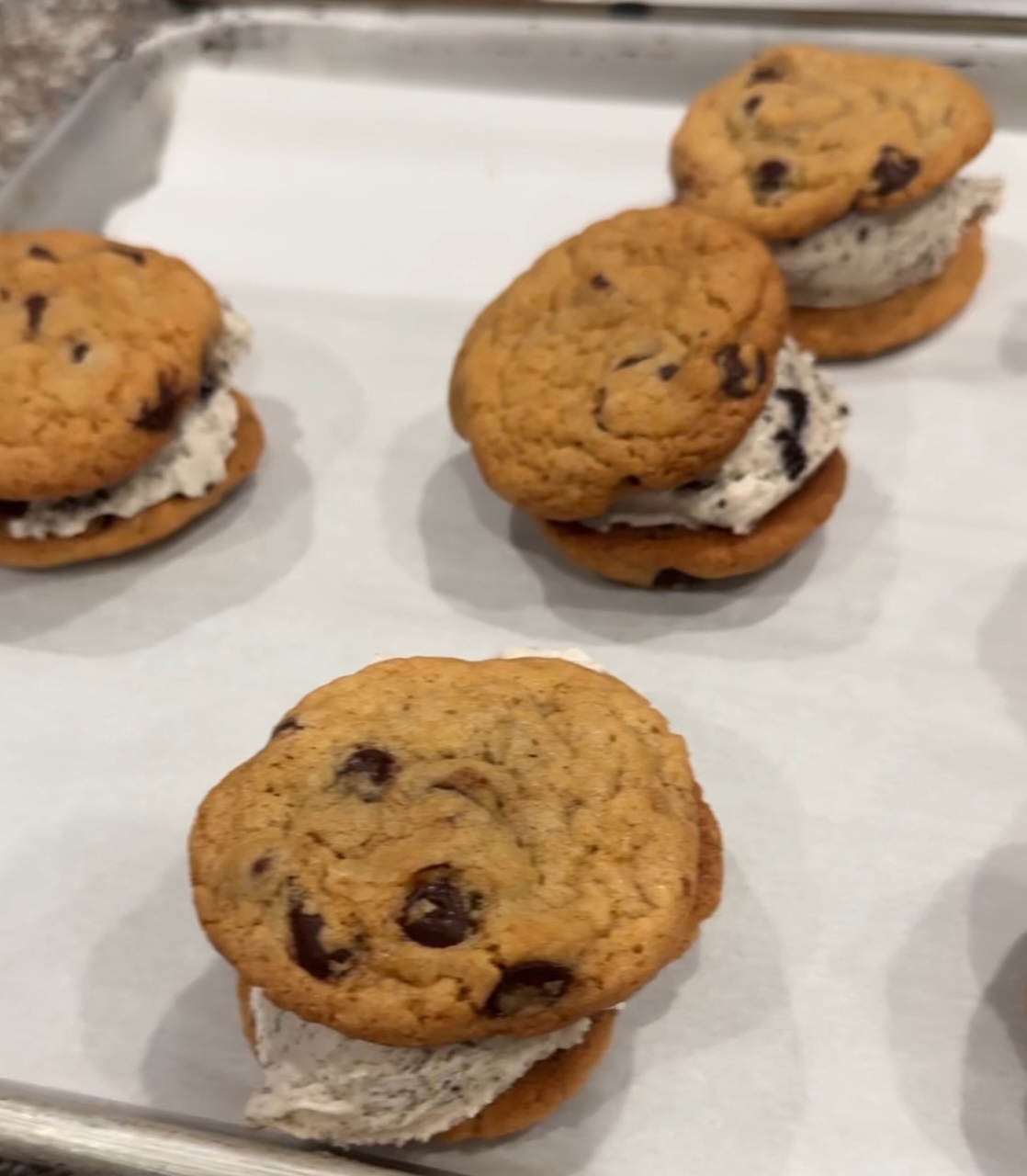 Fresh ice cream cookie sandwiches on a serving tray