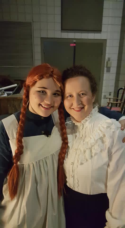 Two people wearing historical attire