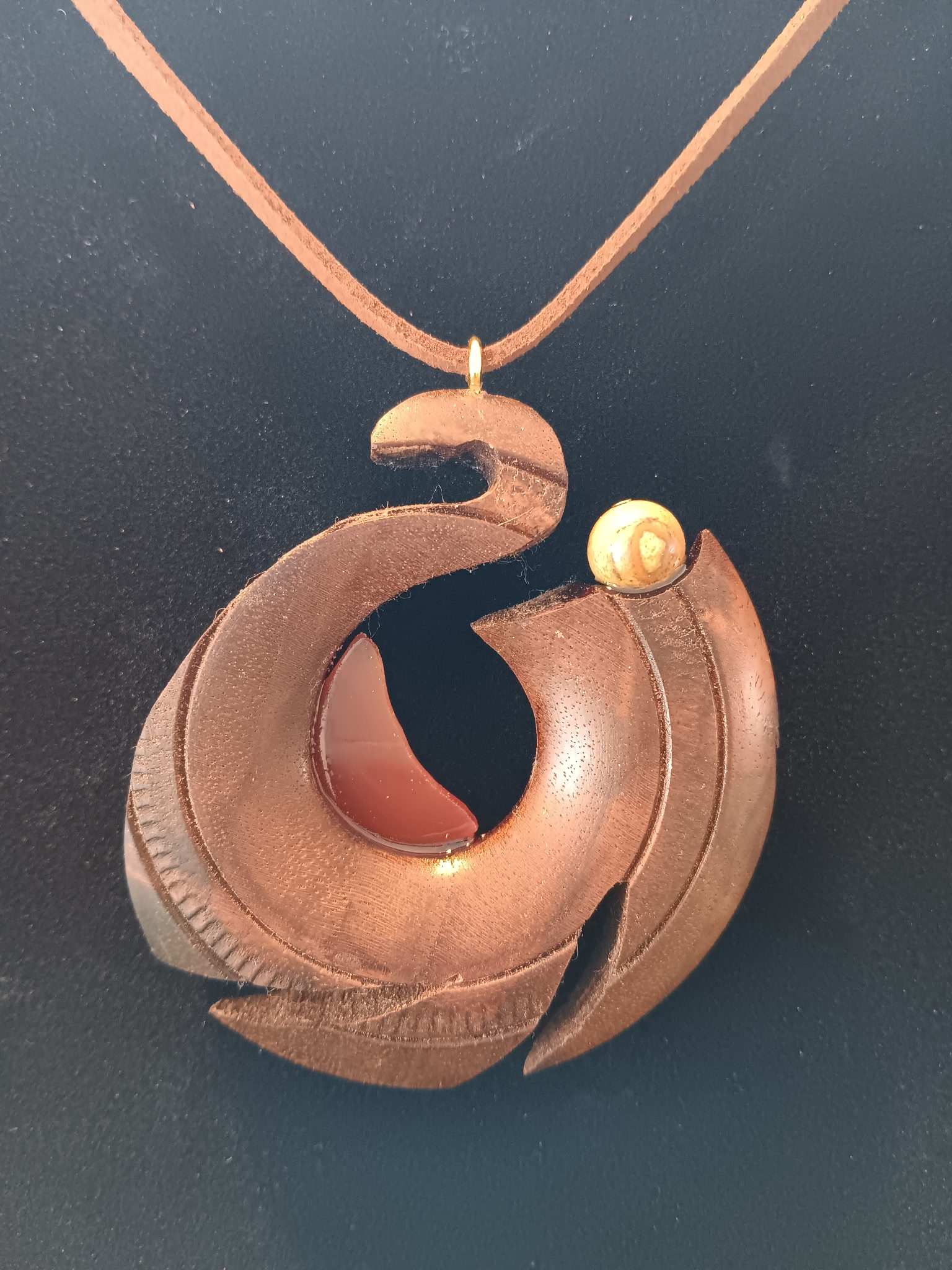 Swan — hand-carved walnut medallion No. 7 by Monroe Irwin Smart