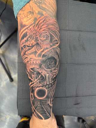 Shaded black and grey tattoo piece