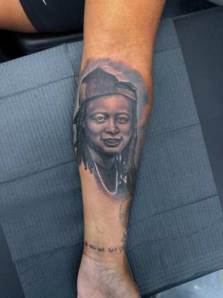 Saturated color realism tattoo close up